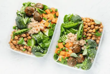 two bento boxes containing vegan lunches - best vegan lunch ideas